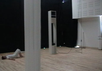 dancer lying on floor in dance studio